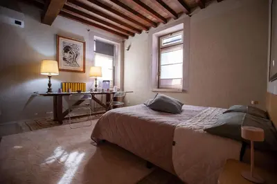 Letto o letti in una camera di La Luna nel Pozzo