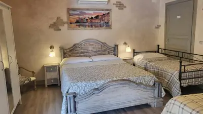 Letto o letti in una camera di B&b Il Rustico