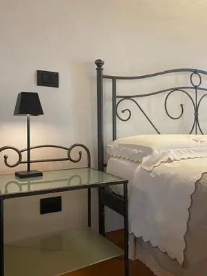 Letto o letti in una camera di B&B Molinetto