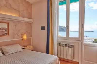 Letto o letti in una camera di Albergo Celeste