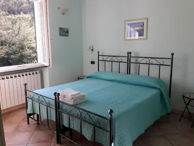 Letto o letti in una camera di B&B Oasi Verde