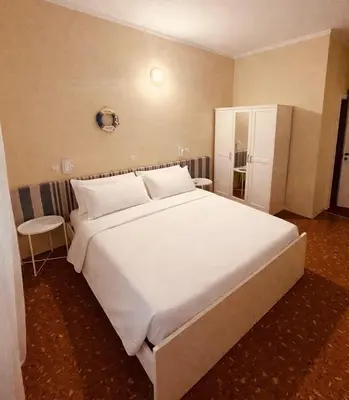 Letto o letti in una camera di Hotel Elisabetta