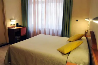 Letto o letti in una camera di Hotel Button