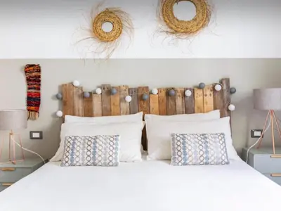 Letto o letti in una camera di COCOON, Iconic Design in Historic Center & Breakfast