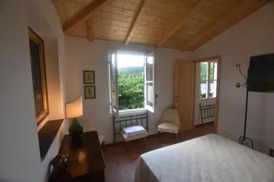 Letto o letti in una camera di Casa di Dino alla Brusa