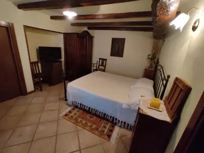 Letto o letti in una camera di Agriturismo Alpi