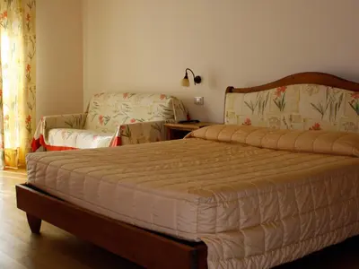 Letto o letti in una camera di Cà Del Moro Resort & SPA