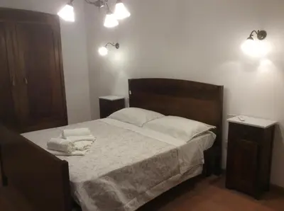 Letto o letti in una camera di Le Apuane Holidays