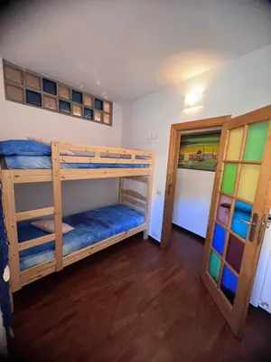 Letto o letti in una camera di Casa Alba