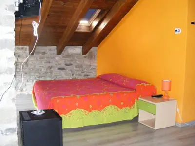 Letto o letti in una camera di Albergo diffuso Casa delle Favole