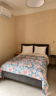 Letto o letti in una camera di Collimare Rooms & Sailing near 5 Terre