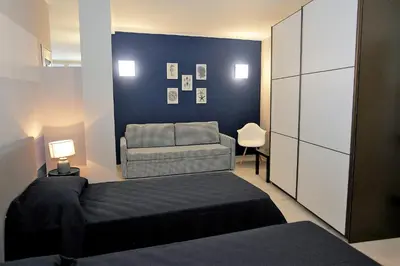 Letto o letti in una camera di Il Convento Case Vacanze