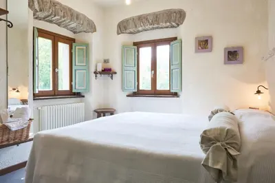 Letto o letti in una camera di Mulino Marghen - Restored WaterMill - Accomodation and Retreat Center