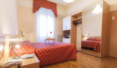 Letto o letti in una camera di Hotel Principe