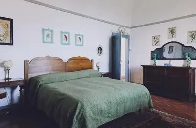 Letto o letti in una camera di Castello Malaspina di Fosdinovo