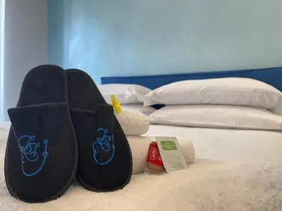 Letto o letti in una camera di Appartamento Guido