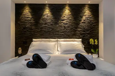 Letto o letti in una camera di Appartamento Guido