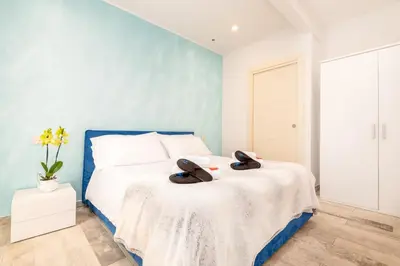Letto o letti in una camera di Appartamento Guido