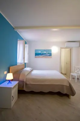 Letto o letti in una camera di Casa Gardan
