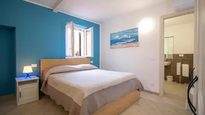 Letto o letti in una camera di Casa Gardan