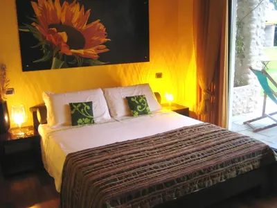 Letto o letti in una camera di Agriturismo Corte Carnevale