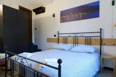 Letto o letti in una camera di Fattore 8