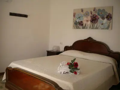 Letto o letti in una camera di casetta del nonno bis