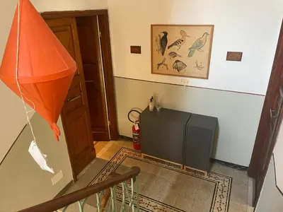 Area soggiorno di Casa Righetti Liguria, Three indipendent apartments in a 1924 family home with garden, stay together, live separately