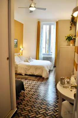 Letto o letti in una camera di Giramondo