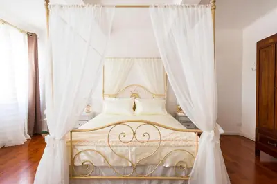 Letto o letti in una camera di La Corte del Duca