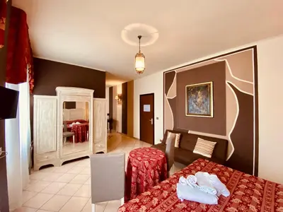Letto o letti in una camera di Art Hotel Pandos