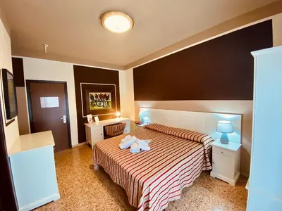 Letto o letti in una camera di Art Hotel Pandos