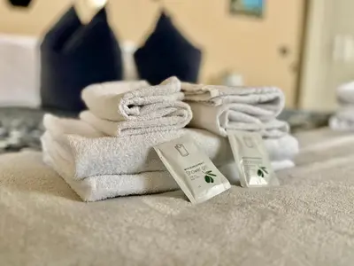 Letto o letti in una camera di Appartamenti ModeRna - Charme & Relax in centro