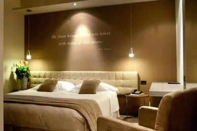 Letto o letti in una camera di Hotel Due Pini