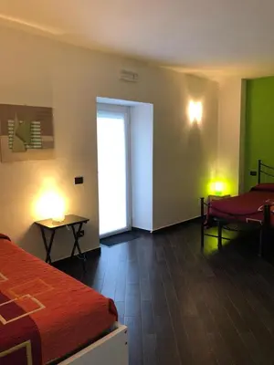 Letto o letti in una camera di Agriturismo Lucchetti Ferrari