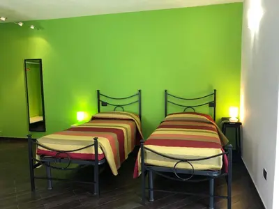 Letto o letti in una camera di Agriturismo Lucchetti Ferrari
