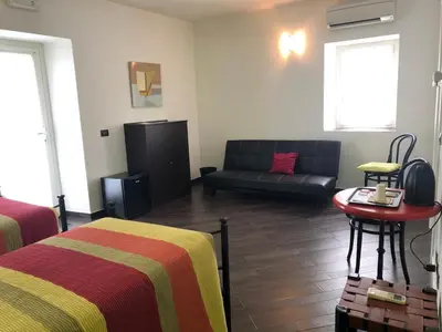 Letto o letti in una camera di Agriturismo Lucchetti Ferrari