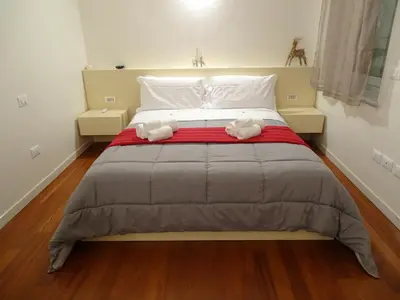 Letto o letti in una camera di Suite Alcova