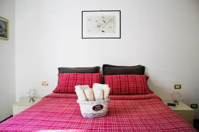 Letto o letti in una camera di La Casa dei Fiori