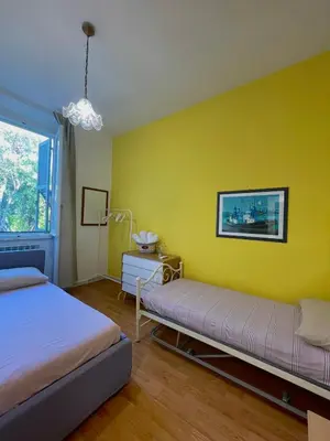 Letto o letti in una camera di La Casa dei Fiori