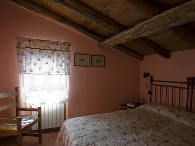 Letto o letti in una camera di Costa D'Orsola