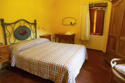 Letto o letti in una camera di Costa D'Orsola
