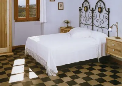Letto o letti in una camera di Costa D'Orsola
