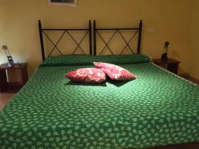 Letto o letti in una camera di Elicrim
