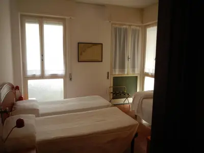 Letto o letti in una camera di Hotel Miriam