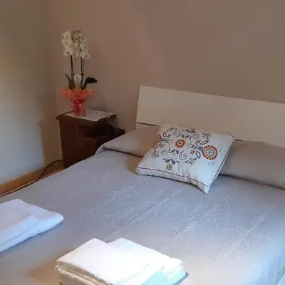 Letto o letti in una camera di Appartamento Modena Park