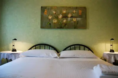 Letto o letti in una camera di Ai Giardini del Te