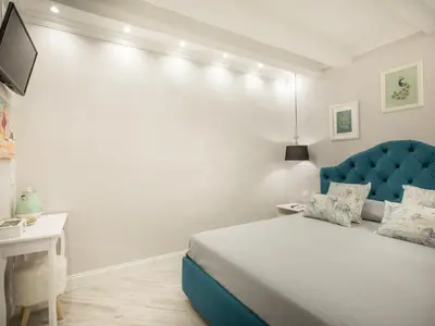 Letto o letti in una camera di A cà da Alba Rooms