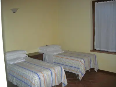 Letto o letti in una camera di Agriturismo Campass