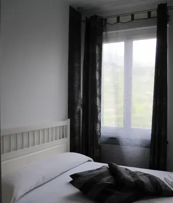 Letto o letti in una camera di B&B Le Giare